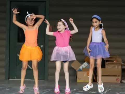 a group of girls wearing clothing