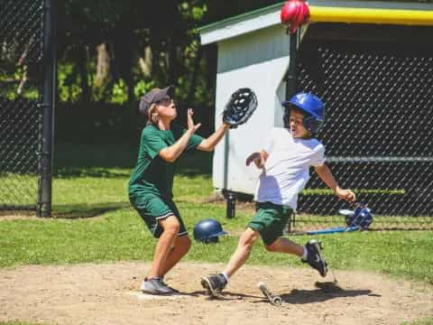 a couple of kids playing baseball