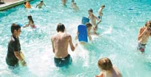 a group of people in a pool