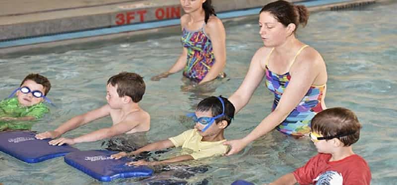 a group of people in a pool