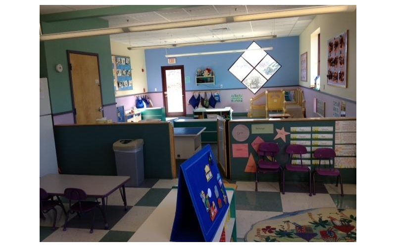 a room with desks and chairs