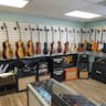 Helotes Guitar company logo