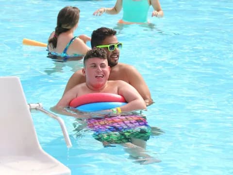 a group of people in a pool