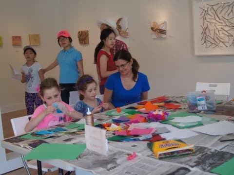 a group of people around a table