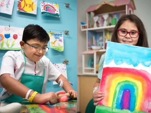a couple of kids painting
