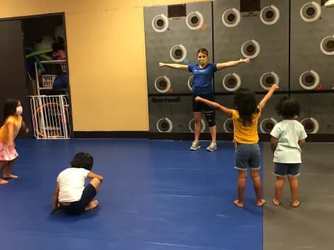a group of people lifting weights