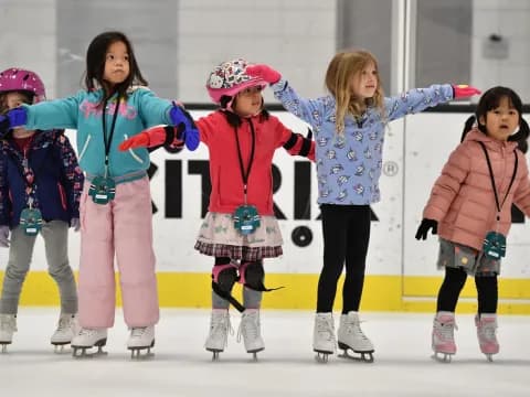 a group of girls on ice skates