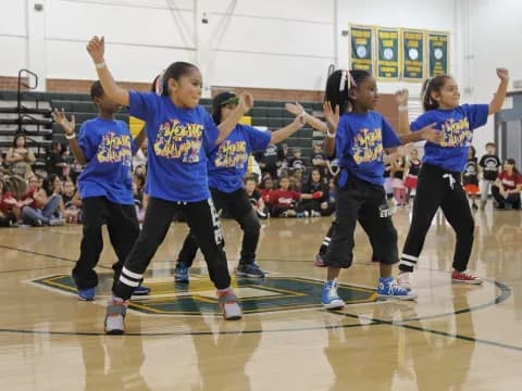a group of girls in a gym