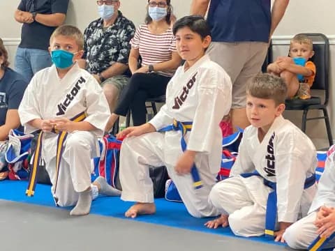 a group of people wearing masks