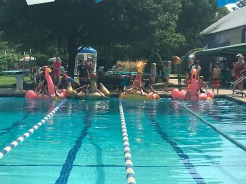 a group of people in a pool