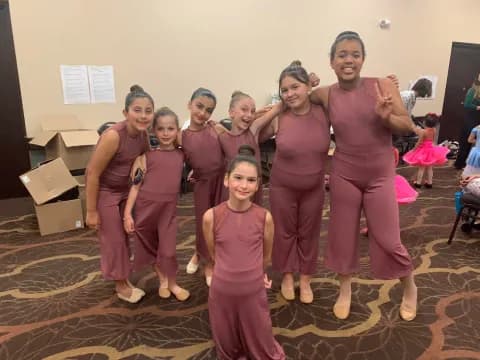 a group of women in pink