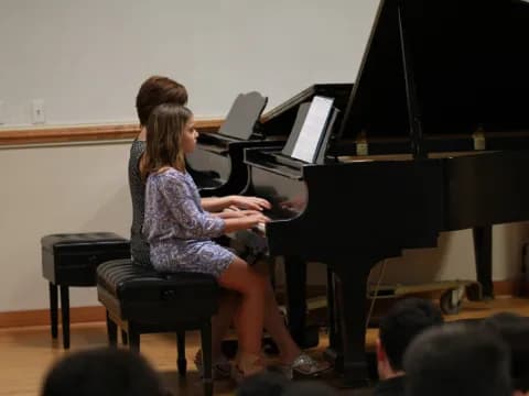 a person playing a piano