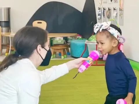a person holding a baby