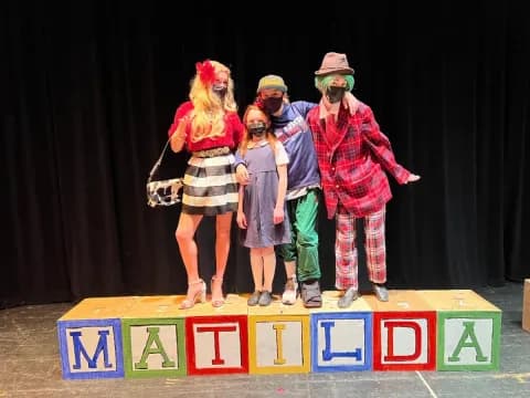 a group of people on a stage