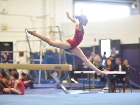 a woman doing gymnastics