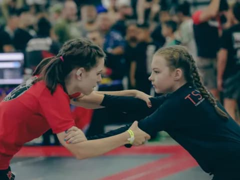 a couple of women playing a sport
