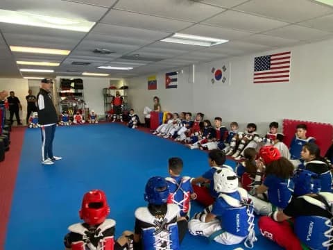 a group of kids in a gym