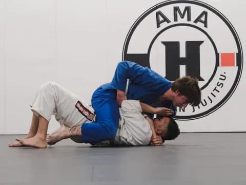 a man kicking another man