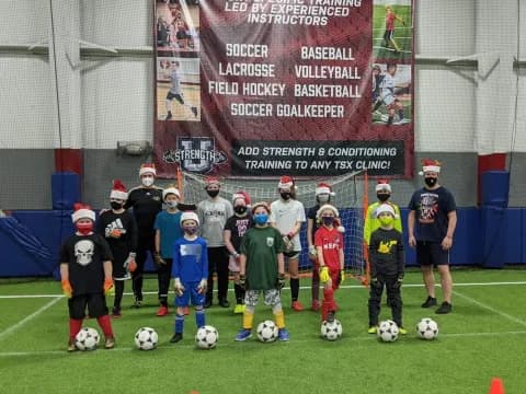 a group of kids playing football