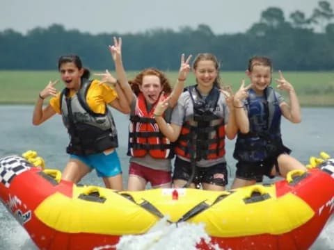 a group of people in a raft