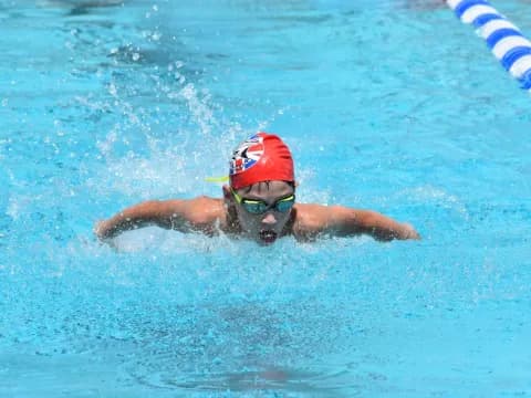 a person swimming in a pool
