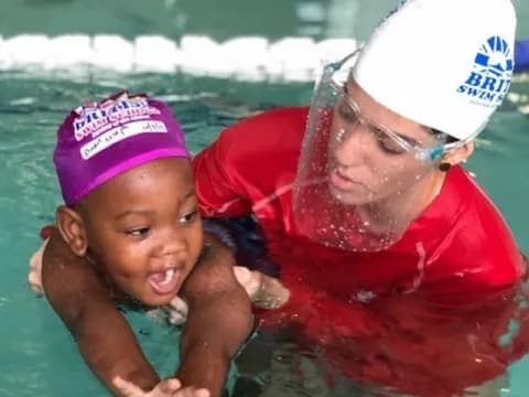 a person and a child in a pool