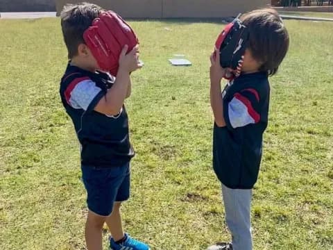 two children wearing helmets