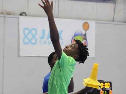 a person raising the hand