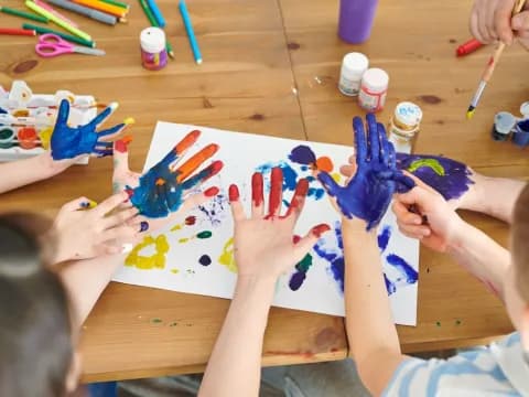 a group of children painting