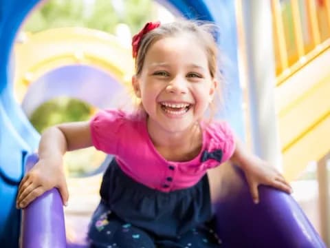 a girl smiling at the camera