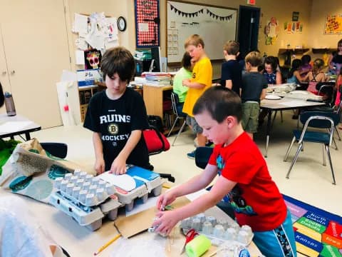 a group of kids in a classroom