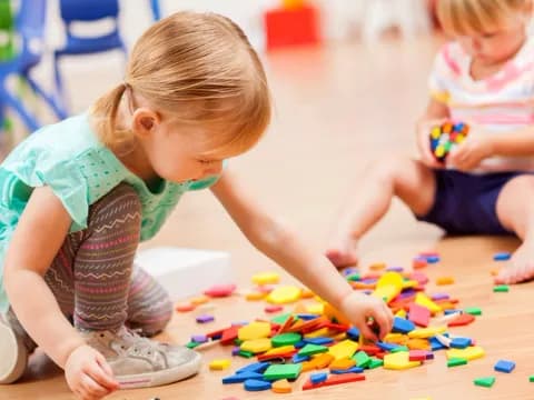 a few children playing with toys