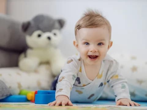 a baby sitting at a table