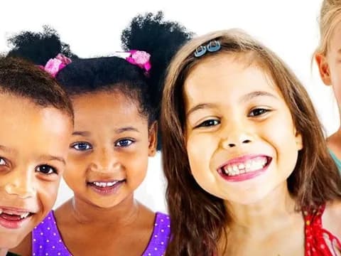 a group of children smiling