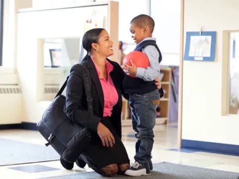 a person holding a baby