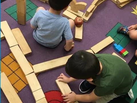 a few children playing on a table