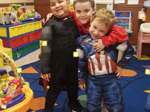 a person and two boys
