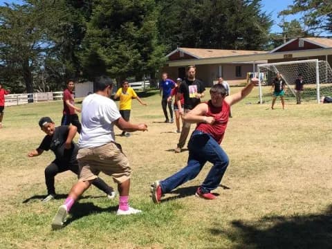 a group of people playing a game