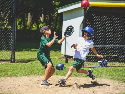 a couple of kids playing baseball