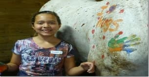 a child sitting on a couch