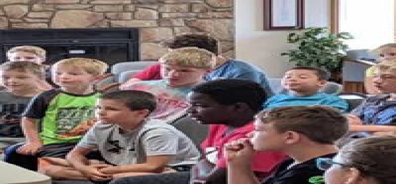 a group of children in a classroom