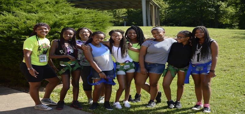 a group of girls posing for a picture