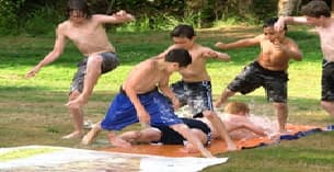a group of men playing in the sand