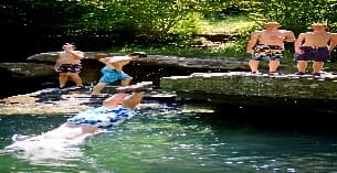 a group of people in a pool