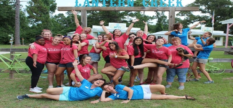 a group of people posing for a photo