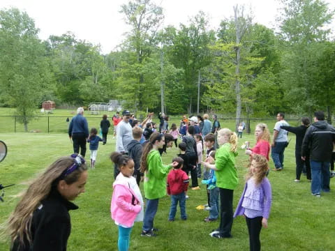 a group of people in a park