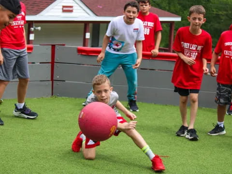 a group of boys playing football