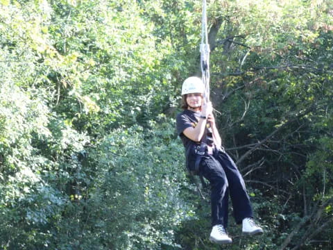 a man on a rope swing