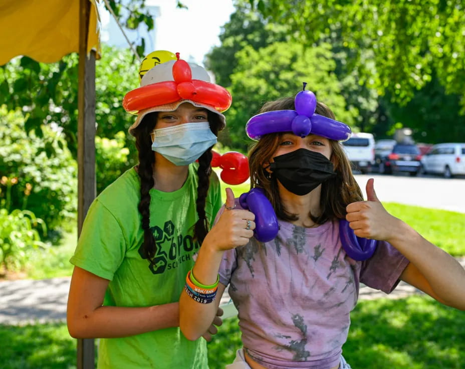 a couple of people wearing clothing