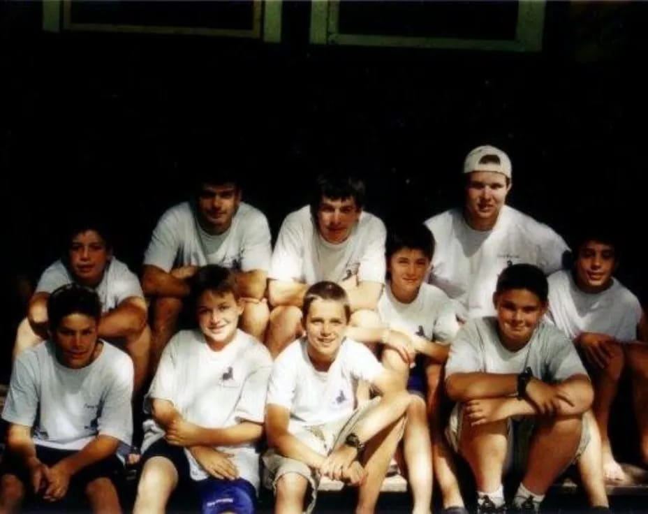 a group of men sitting together